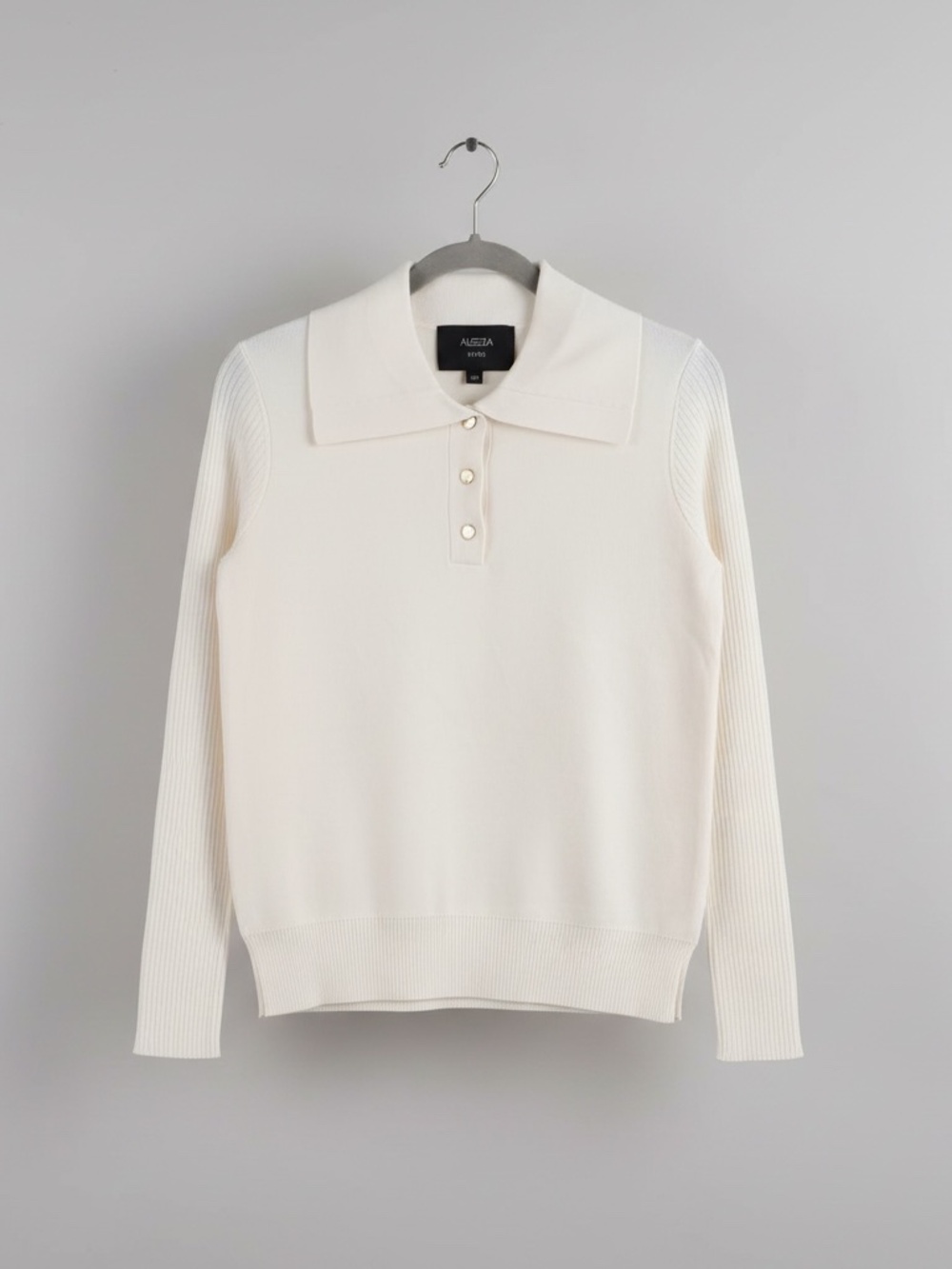Aleeza Paris white knit button top